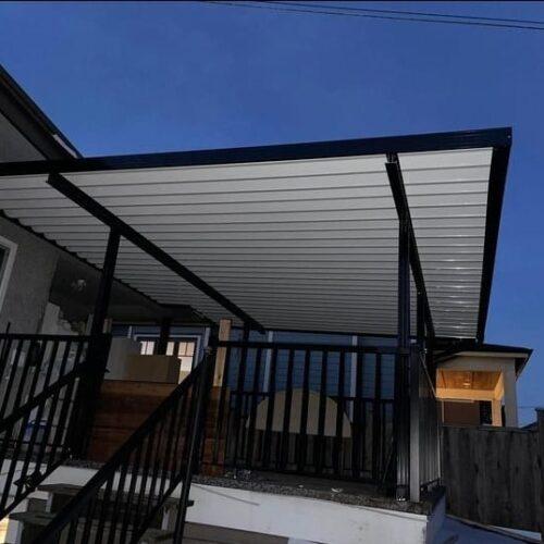 Aluminum patio cover with black frame