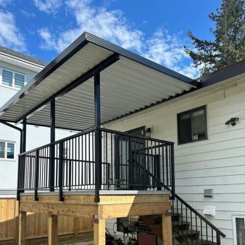 Aluminum patio cover installation Vancouver BC with glass roof and modern railing